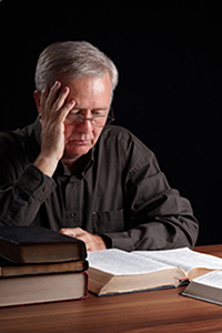 An individual researching and studying.